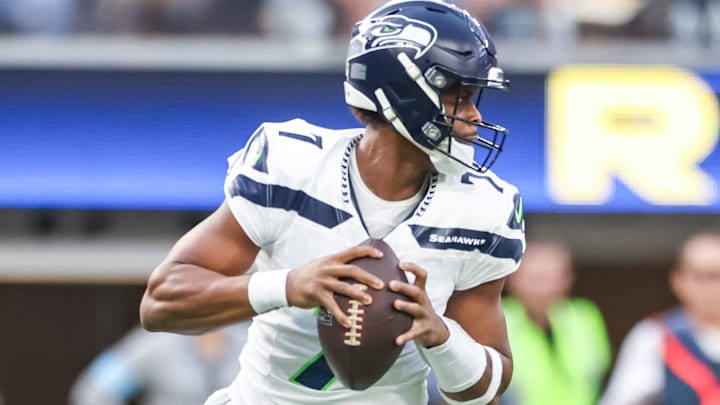 Jan 5, 2025; Inglewood, California, USA; Seattle Seahawks Geno Smith (7) in the pocket during the 1st quarter versus the Los Angeles Rams at SoFi Stadium. Mandatory Credit: William Navarro-Imagn Images