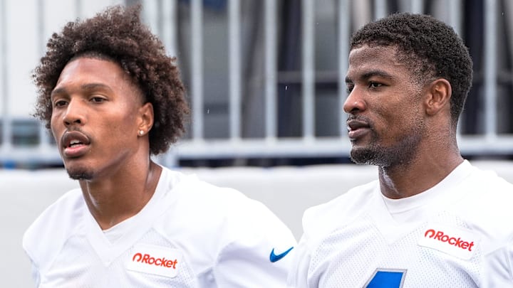 Detroit Lions cornerback D.J. Reed (4), right, and cornerback Tyson Russell (35) walk off the field Detroit Lions cornerback D.J. Reed (4), right, and cornerback Tyson Russell (35) walk off the field