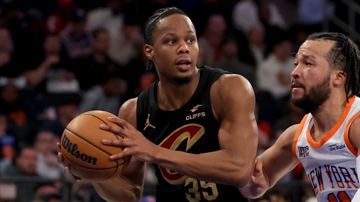 Apr 11, 2025; New York, New York, USA; Cleveland Cavaliers forward Isaac Okoro (35) looks to pass the ball against New York Knicks guard Jalen Brunson (11) during the first quarter at Madison Square Garden. Mandatory Credit: Brad Penner-Imagn Images
