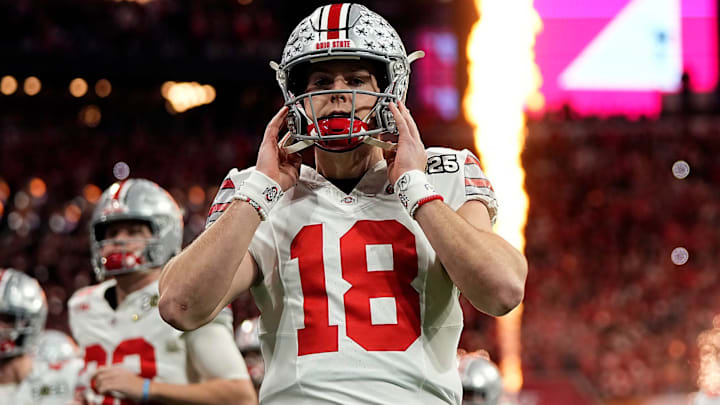 Ohio State Buckeyes quarterback Will Howard (18) take the field for the start of the game against Notre Dame Fighting Irish during the College Football Playoff National Championship at Mercedes-Benz Stadium in Atlanta on January 20, 2025.