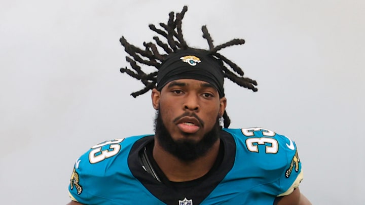 Jacksonville Jaguars running back Bhayshul Tuten (33) is introduced before an NFL football game at EverBank Stadium, Sunday, Dec. 7, 2025, in Jacksonville, Fla. The Jaguars defeated the Colts 36-19.