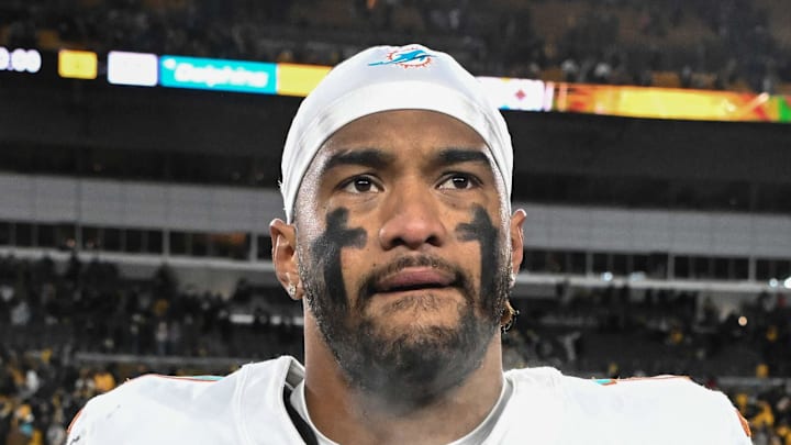 Dec 15, 2025; Pittsburgh, Pennsylvania, USA; Miami Dolphins quarterback Tua Tagovailoa (1) leaves the  field following a game against the Pittsburgh Steelers at Acrisure Stadium. Mandatory Credit: Barry Reeger-Imagn Images