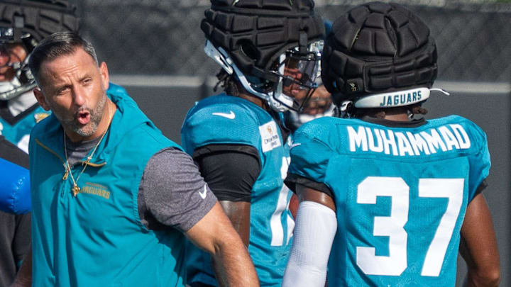 Jacksonville Jaguars Defensive Coordinator Anthony Campanile talks to Jacksonville Jaguars cornerback Jabbar Muhammad (37) after he fumbled the ball during the Jaguars 14th NFL training camp session at Miller Electric Center Tuesday August 12, 2025 in Jacksonville, Fla. The Jaguars travel to New Orleans to play the Saints this Sunday in their second preseason game. [Doug Engle/Florida Times-Union]