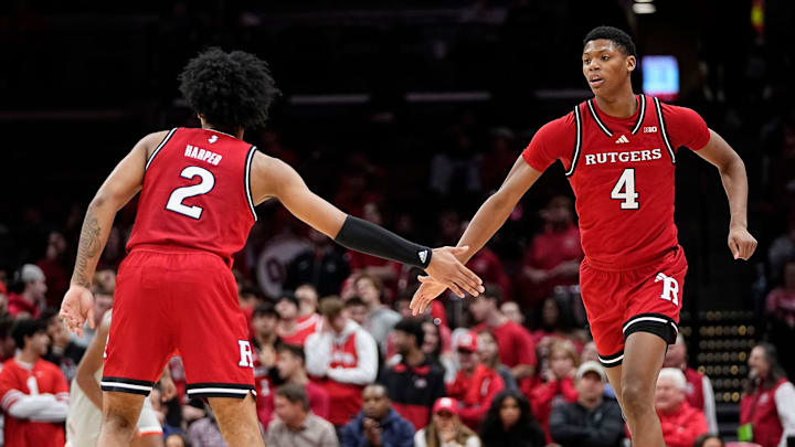Rutgers Scarlet Knights guard Dylan Harper (2) high fives guard Ace Bailey (4) during the second half of the NCAA men's basketball game against the Ohio State Buckeyes at Value City Arena in Columbus on Saturday, Dec. 7, 2024. Ohio State won 80-66.