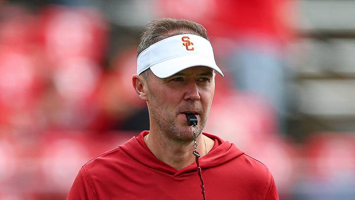 Sep 19, 2026; Piscataway, New Jersey, USA;  USC Trojans head coach Lincoln Riley on the field during warm ups before the game against the Rutgers Scarlet Knights at SHI Stadium. 