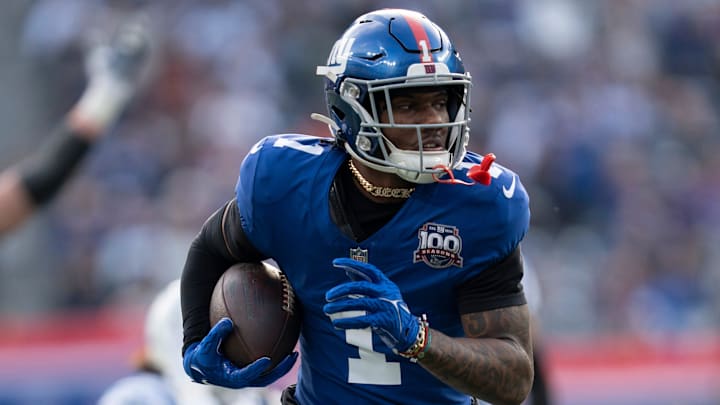 New York Giants receiver Malik Nabers scores a touchdown.