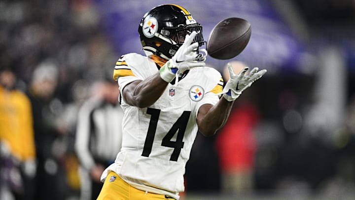Jan 11, 2025; Baltimore, Maryland, USA; Pittsburgh Steelers wide receiver George Pickens (14) makes a catch against the Baltimore Ravens in the third quarter in an AFC wild card game at M&T Bank Stadium. Mandatory Credit: Tommy Gilligan-Imagn Images