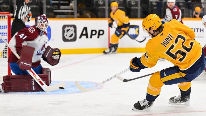 Oct 25, 2026; Nashville, Tennessee, USA; Colorado Avalanche goaltender Scott Wedgewood (41) blocks the shot of Nashville Predators defenseman Daemon Hunt (52) during the first period at Bridgestone Arena. Mandatory Credit: Steve Roberts-Imagn Images Oct 25, 2026; Nashville, Tennessee, USA; Colorado Avalanche goaltender Scott Wedgewood (41) blocks the shot of Nashville Predators defenseman Daemon Hunt (52) during the first period at Bridgestone Arena. Mandatory Credit: Steve Roberts-Imagn Images