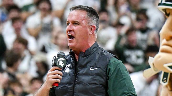 Michigan State's new football coach Pat Fitzgerald addresses the crowd during a timeout in the first half of the Spartans basketball game against Iowa on Tuesday, Dec. 2, 2025, at the Breslin Center in East Lansing. Michigan State's new football coach Pat Fitzgerald addresses the crowd during a timeout in the first half of the Spartans basketball game against Iowa on Tuesday, Dec. 2, 2025, at the Breslin Center in East Lansing.