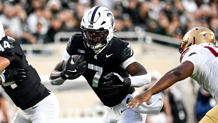 Michigan State's Brandon Tullis runs for a gain against Boston College's during the first quarter on Saturday, Sept. 6, 2025, at Spartan Stadium in East Lansing. Michigan State's Brandon Tullis runs for a gain against Boston College's during the first quarter on Saturday, Sept. 6, 2025, at Spartan Stadium in East Lansing.