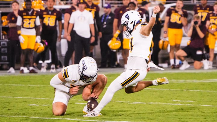 Aug 30, 2025; Tempe, Arizona, USA; Northern Arizona Lumberjacks place kicker Samuel Hunsaker (91) kicks a field goal to score for NAU during the second quarter of the game between Arizona State Sun Devils and Northern Arizona Lumberjacks at Mountain America Stadium. Mandatory Credit: Arianna Grainey-Imagn Images