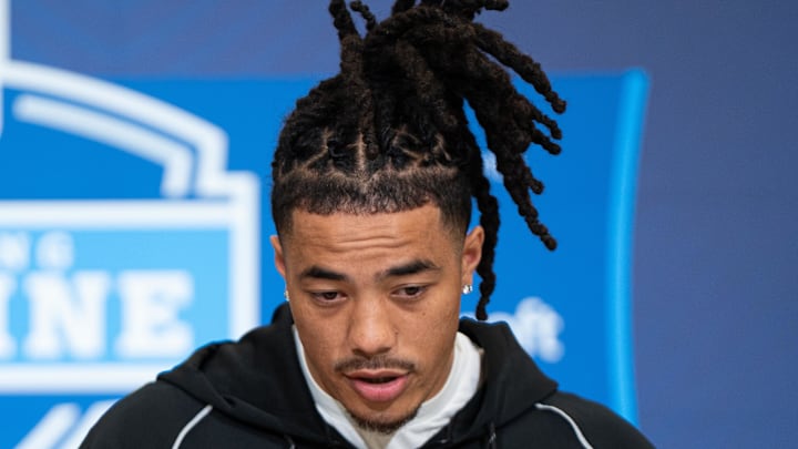 Feb 27, 2026; Indianapolis, IN, USA; Southern California wideout Makai Lemon (WO29) speaks to members of the media during the NFL Combine at the Indiana Convention Center. 