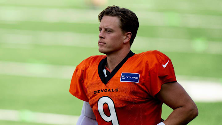 Cincinnati Bengals quarterback Joe Burrow (9) runs onto the field during Bengals Camp practice at Paycor Stadium in Cincinnati on Aug. 2, 2025.