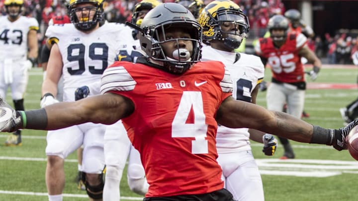 Nov 26, 2016; Columbus, OH, USA; Ohio State Buckeyes running back Curtis Samuel (4) celebrates after scoring the game winning touchdown against the Michigan Wolverines in the second overtime at Ohio Stadium. Ohio State won the game 30-27 in double overtime.Mandatory Credit: Greg Bartram-Imagn Images