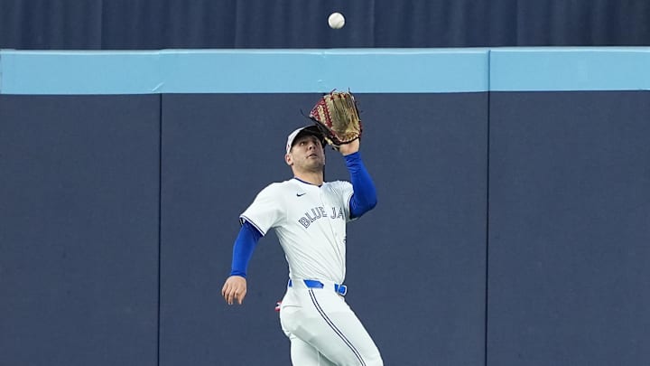 May 18, 2025; Toronto, Ontario, CAN; Toronto Blue Jays centre fielder Daulton Varsho (5) catches a fly ball for an out against the Detroit Tigers during the fourth inning at Rogers Centre.