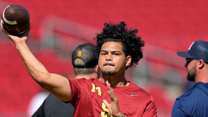Sep 6, 2025; Los Angeles, California, USA;  USC Trojans quarterback Jayden Maiava (14) warms up prior to the game against the Georgia Southern Eagles at United Airlines Field at Los Angeles Memorial Coliseum. Mandatory Credit: Jayne Kamin-Oncea-Imagn Images