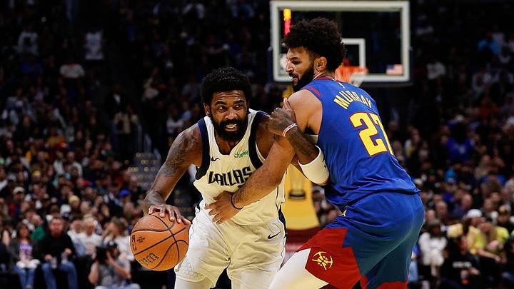 Nov 22, 2024; Denver, Colorado, USA; Dallas Mavericks guard Kyrie Irving (11) drives to the basket against Denver Nuggets guard Jamal Murray (27) in the third quarter at Ball Arena. Nov 22, 2024; Denver, Colorado, USA; Dallas Mavericks guard Kyrie Irving (11) drives to the basket against Denver Nuggets guard Jamal Murray (27) in the third quarter at Ball Arena.