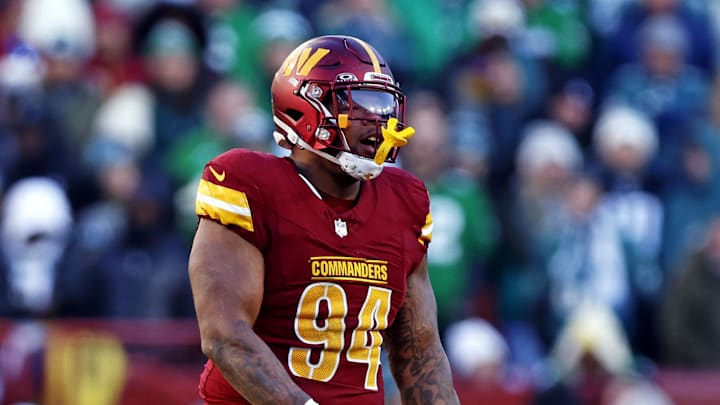 Dec 22, 2024; Landover, Maryland, USA; Washington Commanders defensive tackle Daron Payne (94) celebrates after a play during the third quarter against the Philadelphia Eagles at Northwest Stadium. Mandatory Credit: Peter Casey-Imagn Images