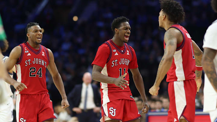 Jan 17, 2026; Philadelphia, Pennsylvania, USA; St. John's basketball guard Ian Jackson (11) reacts to a score against the Villanova Wildcats during the second half at Xfinity Mobile Arena.