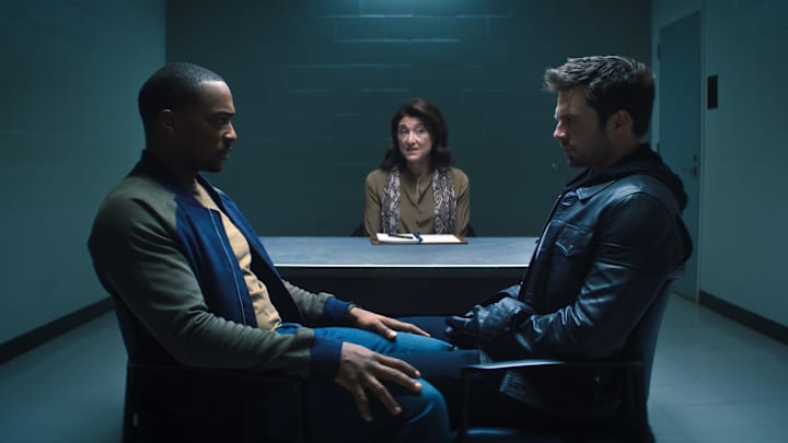 (L-R): Falcon/Sam Wilson (Anthony Mackie), therapist (Amy Aquino) and Winter Soldier/Bucky Barnes (Sebastian Stan) in Marvel Studios’ THE FALCON AND THE WINTER SOLDIER. Photo courtesy of Marvel Studios. ©Marvel Studios 2021. All Rights Reserved.