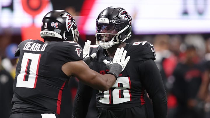 Atlanta Falcons linebacker Divine Deablo (0) and defensive tackle David Onyemata (90)
