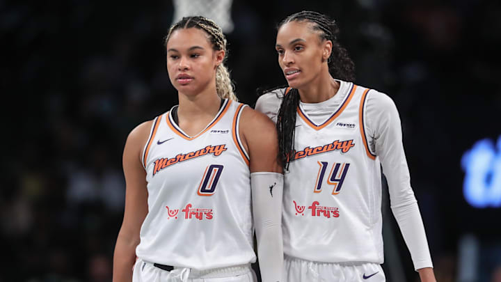 Sep 17, 2025; Brooklyn, New York, USA; Phoenix Mercury forward DeWanna Bonner (14) talks with forward Satou Sabally (0) during game two of round one for the 2025 WNBA Playoffs against the New York Liberty at Barclays Center. Mandatory Credit: Wendell Cruz-Imagn Images