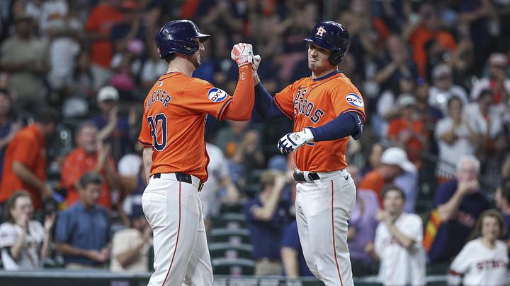 Sep 20, 2024; Houston, Texas, USA; Houston Astros third baseman Alex Bregman (2) celebrates with right fielder Kyle Tucker (30) after hitting a home run during the third inning at Minute Maid Park. Mandatory Credit: Troy Taormina-Imagn Images