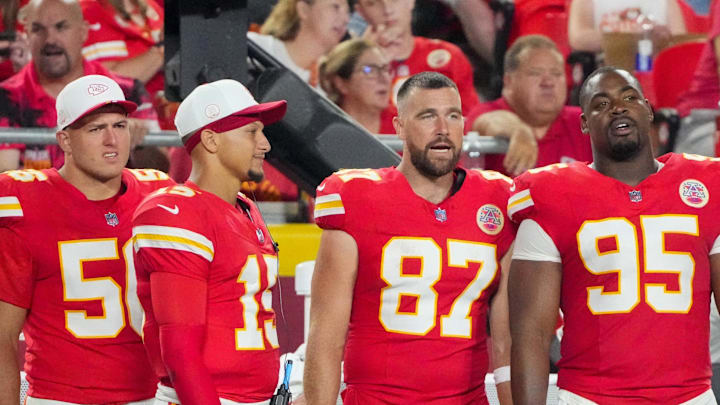 Aug 22, 2025; Kansas City, Missouri, USA; Kansas City Chiefs defensive end George Karlaftis (56) and quarterback Patrick Mahomes (15) and tight end Travis Kelce (87) and defensive tackle Chris Jones (95) watch play against the Chicago Bears during the second half of the game at GEHA Field at Arrowhead Stadium. Mandatory Credit: Denny Medley-Imagn Images Aug 22, 2025; Kansas City, Missouri, USA; Kansas City Chiefs defensive end George Karlaftis (56) and quarterback Patrick Mahomes (15) and tight end Travis Kelce (87) and defensive tackle Chris Jones (95) watch play against the Chicago Bears during the second half of the game at GEHA Field at Arrowhead Stadium. Mandatory Credit: Denny Medley-Imagn Images