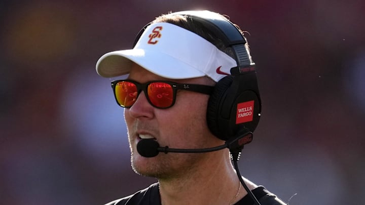 Aug 30, 2025; Los Angeles, California, USA; Southern California Trojans head coach Lincoln Riley watches from the sidelines against the Missouri State Bears in the first half at United Airlines Field at Los Angeles Memorial Coliseum. Mandatory Credit: Kirby Lee-Imagn Images
