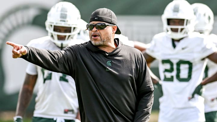 Michigan State's cornerbacks coach Demetrice Martin works with players during the first day of football camp on Tuesday, July 30, 2024, in East Lansing.