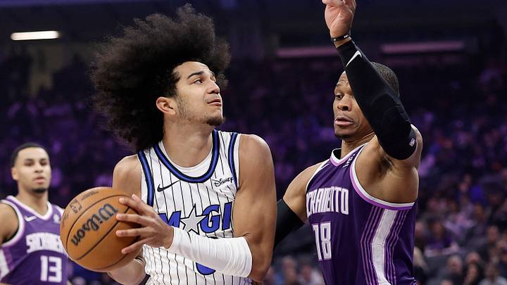 Feb 19, 2026; Sacramento, California, USA; Orlando Magic guard Anthony Black (0) drives in against Sacramento Kings guard Russell Westbrook (18) during the first quarter at Golden 1 Center. Mandatory Credit: Kelley L Cox-Imagn Images Feb 19, 2026; Sacramento, California, USA; Orlando Magic guard Anthony Black (0) drives in against Sacramento Kings guard Russell Westbrook (18) during the first quarter at Golden 1 Center. Mandatory Credit: Kelley L Cox-Imagn Images