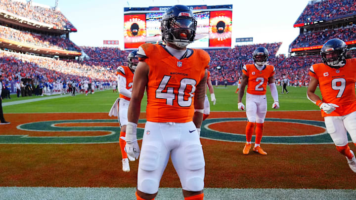 Oct 19, 2025; Denver, Colorado, USA; Denver Broncos linebacker Justin Strnad (40) celebrates after an interception during the second half against the New York Giants at Empower Field at Mile High. Oct 19, 2025; Denver, Colorado, USA; Denver Broncos linebacker Justin Strnad (40) celebrates after an interception during the second half against the New York Giants at Empower Field at Mile High.
