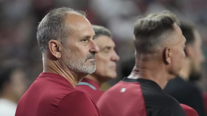 Arizona Diamondbacks manager Torey Lovullo (17) stands for the national anthem before playing against the Boston Red Sox at Chase Field on Sept. 7, 2025.