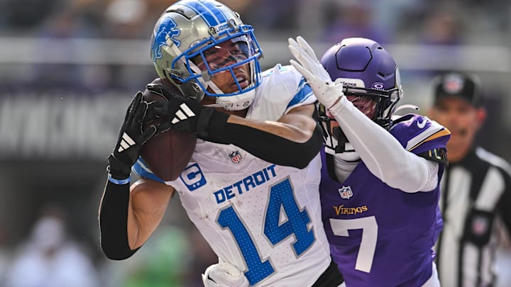 Detroit Lions wide receiver Amon-Ra St. Brown (14) catches a 35 yard touchdown pass against Minnesota Vikings