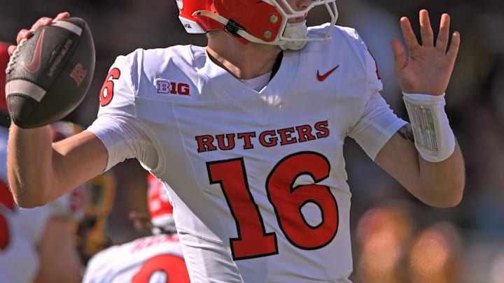 Sep 27, 2025; Minneapolis, Minnesota, USA;  Rutgers Scarlet Knights quarterback Athan Kaliakmanis (16) makes a pass against the Minnesota Golden Gophers during the first quarter at Huntington Bank Stadium. Mandatory Credit: Nick Wosika-Imagn Images