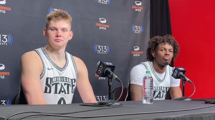 Michigan State Spartans forwards Jaxon Kohler, left, and Coen Carr, right, listen to a question after a 79-70 win over the Oakland Golden Grizzlies at Little Caesars Arena on Saturday, Dec. 20, 2025.