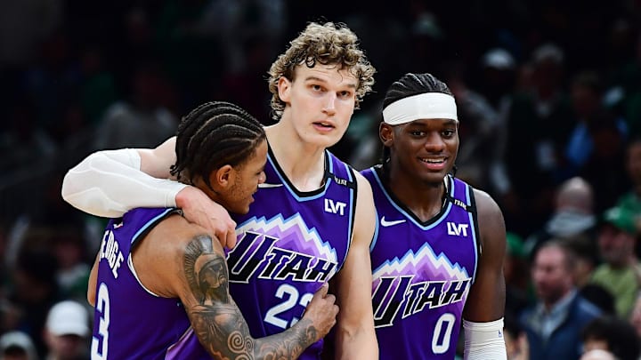 Nov 3, 2025; Boston, Massachusetts, USA; Utah Jazz guard Keyonte George (3), forward Lauri Markkanen (23), and forward Taylor Hendricks (0) react during the second half against the Boston Celtics at TD Garden. Mandatory Credit: Bob DeChiara-Imagn Images