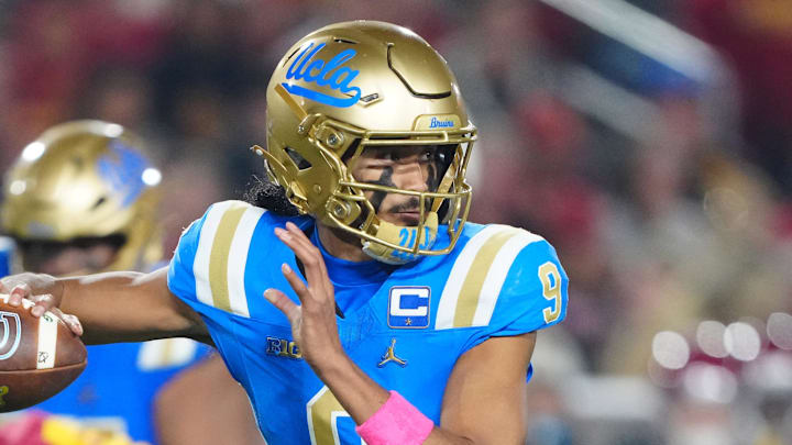 Nov 29, 2025; Los Angeles, California, USA; UCLA Bruins quarterback Nico Iamaleava (9) throws the ball against the Southern California Trojans in the first half at United Airlines Field at Los Angeles Memorial Coliseum. Mandatory Credit: Kirby Lee-Imagn Images