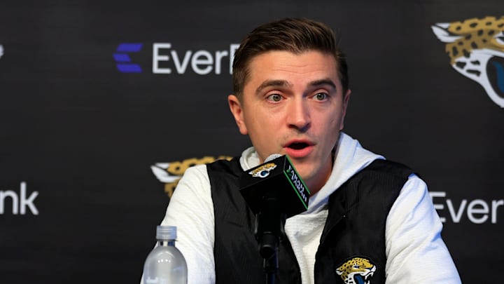 Jacksonville Jaguars general manager James Gladstone, right, speaks as head coach Liam Coen looks on during a press conference at the Miller Electric Center, Wednesday, Jan. 14, 2026, in Jacksonville, Fla.