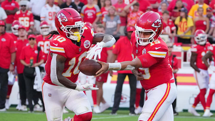 Sep 28, 2025; Kansas City, Missouri, USA; Kansas City Chiefs quarterback Patrick Mahomes (15) hands the ball off to Kansas City Chiefs running back Isiah Pacheco (10) during the fourth quarter against the Baltimore Ravens at GEHA Field at Arrowhead Stadium. Mandatory Credit: Denny Medley-Imagn Images