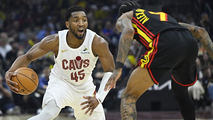 Apr 8, 2026; Cleveland, Ohio, USA; Cleveland Cavaliers guard Donovan Mitchell (45) dribbles defended by Atlanta Hawks guard Nickeil Alexander-Walker (7) in the third quarter at Rocket Arena. Mandatory Credit: David Richard-Imagn Images Apr 8, 2026; Cleveland, Ohio, USA; Cleveland Cavaliers guard Donovan Mitchell (45) dribbles defended by Atlanta Hawks guard Nickeil Alexander-Walker (7) in the third quarter at Rocket Arena. Mandatory Credit: David Richard-Imagn Images