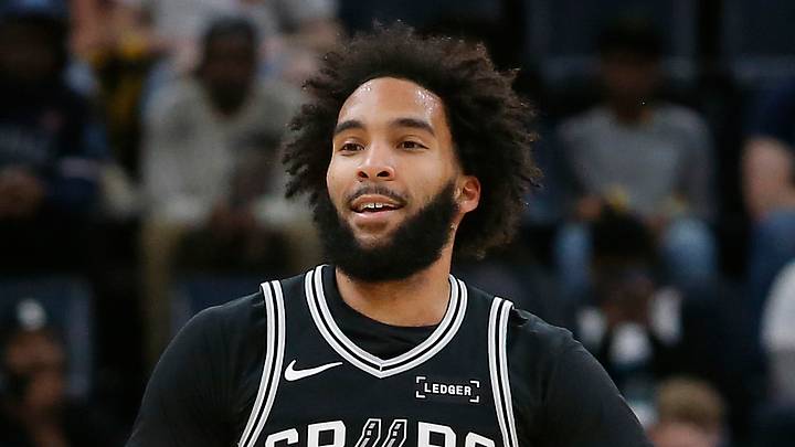 Mar 25, 2026; Memphis, Tennessee, USA; San Antonio Spurs forward Julian Champagnie (30) reacts with guard Devin Vassell (24) during the first quarter against the Memphis Grizzlies at FedExForum. Mandatory Credit: Petre Thomas-Imagn Images