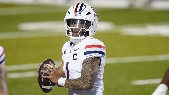 Nov 1, 2025; Boulder, Colorado, USA; Arizona Wildcats quarterback Noah Fifita (1) prepares to pass the ball in second quarter against the Colorado Buffaloes at Folsom Field. Mandatory Credit: Ron Chenoy-Imagn Images