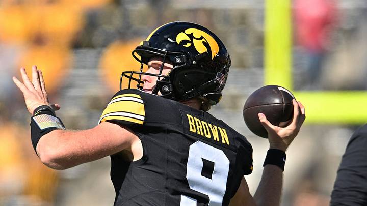 Oct 3, 2026; Iowa City, Iowa, USA;  Iowa Hawkeyes quarterback Hank Brown (9) warms up before the game against the Ohio State Buckeyes at Kinnick Stadium.  Mandatory Credit: Jeffrey Becker-Imagn Images