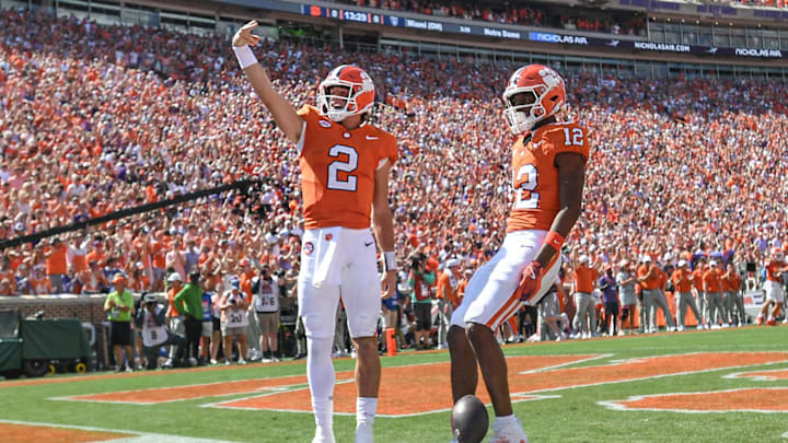 Sep 21, 2024; Clemson, South Carolina, USA; Clemson Tigers quarterback Cade Klubnik (2) waves to the crowd after running in for a touchdown against the North Carolina State Wolfpack at Memorial Stadium. Mandatory Credit: Ken Ruinard-Imagn Images