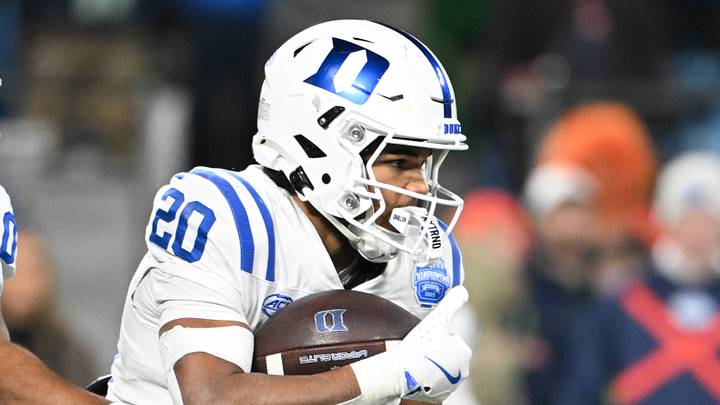 Dec 6, 2025; Charlotte, NC, USA; Duke Blue Devils running back Nate Sheppard (20) receives a hand off in the second quarter against the Virginia Cavaliers during the 2025 ACC Championship game at Bank of America Stadium. Mandatory Credit: Bob Donnan-Imagn Images Dec 6, 2025; Charlotte, NC, USA; Duke Blue Devils running back Nate Sheppard (20) receives a hand off in the second quarter against the Virginia Cavaliers during the 2025 ACC Championship game at Bank of America Stadium. Mandatory Credit: Bob Donnan-Imagn Images
