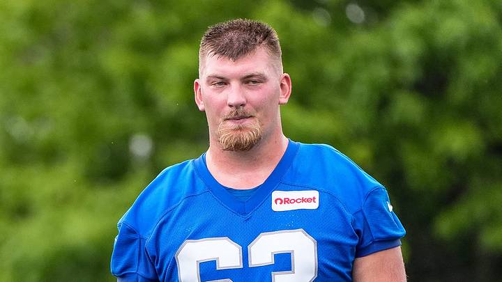 Detroit Lions offensive tackle Colby Sorsdal (75), left, and offensive tackle Mason Miller (63) walk off the field after practice during training camp at Meijer Performance Center in Allen Park on Sunday, July 20, 2025.