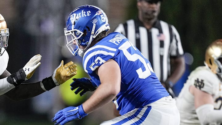 Sep 30, 2023; Durham, North Carolina, USA; Notre Dame Fighting Irish defensive lineman Nana Osafo-Mensah (31) against Duke Blue Devils offensive lineman Brian Parker II (53) during the second half at Wallace Wade Stadium. Mandatory Credit: Jim Dedmon-Imagn Images