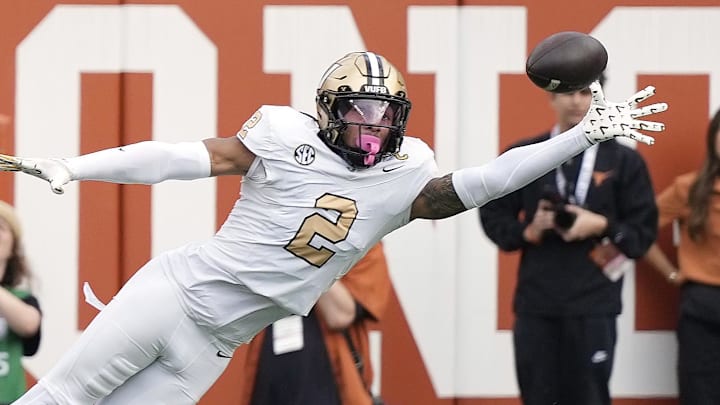 Nov 1, 2025; Austin, Texas, USA; Vanderbilt Commodores defensive back Randon Fontenette (2) attempts to intercept  a pass during the first half against the Texas Longhorns at Darrell K Royal-Texas Memorial Stadium. Mandatory Credit: Scott Wachter-Imagn Images