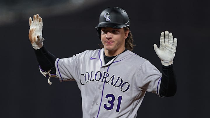 Apr 24, 2026; New York City, New York, USA;  Colorado Rockies center fielder Jake McCarthy (31) reacts after hitting an RBI double during the sixth inning against the New York Mets at Citi Field. Mandatory Credit: Vincent Carchietta-Imagn Images